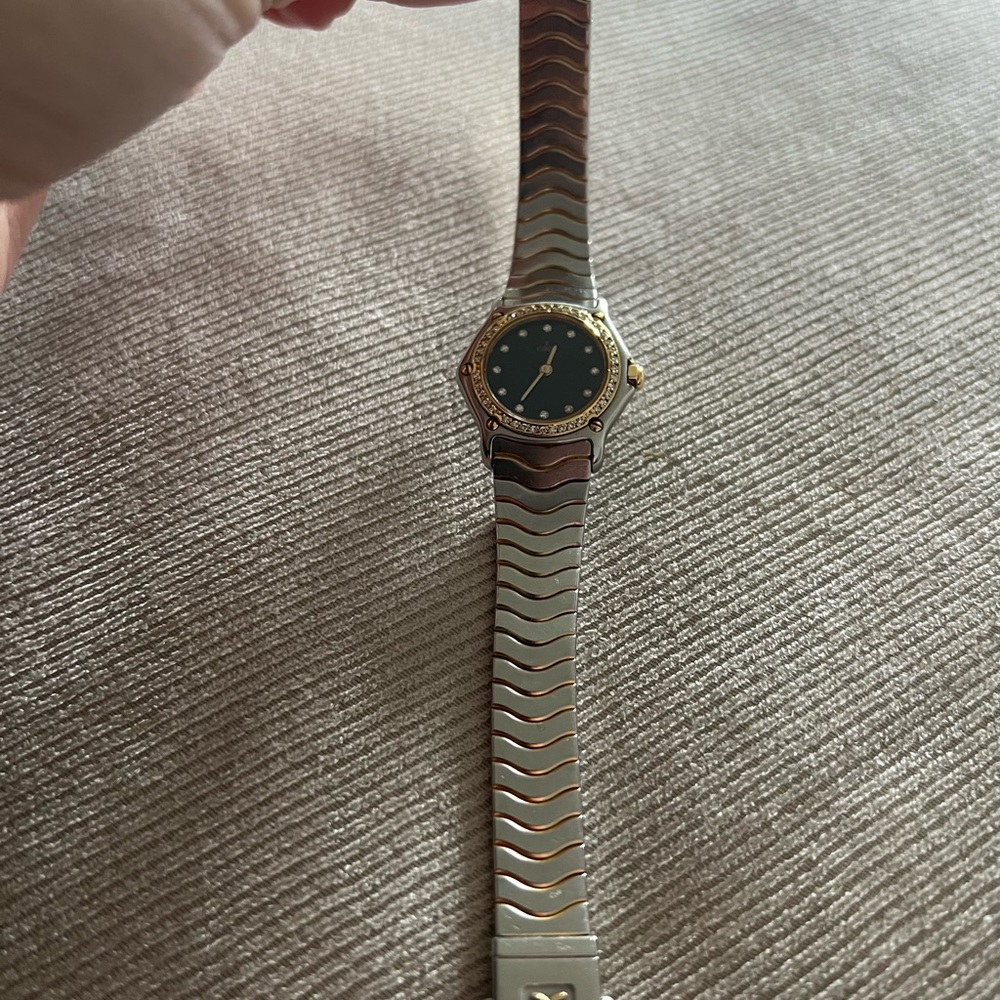 Ebel Classic Wave Watch with gold bezel
